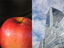 An apple and a skyscraper full of windows