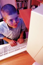 A boy working on a computer
