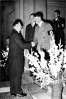Adolf Hitler greets Neville Chamberlain at the beginning of the Bad Godesberg meeting on 24 September 1938