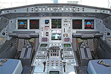 The cockpit of an A340 Airbus airliner