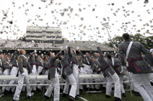 U.S. Military Academy graduates toss their hats during commencement ceremonies at West Point, New York, May 23, 2009