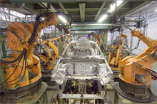 Industrial robots assembling automobiles