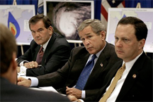 Secretary Tom Ridge, President George W. Bush, and Administrator Michael Brown