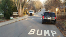 Speed bump and warning signs in Bloomington, Indiana, USA