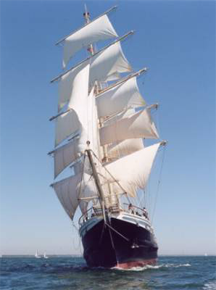 Tenacious under full sail