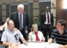 U.S. Congressman Jim Moran talks with constituents at a meeting on the federal budget