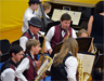 A band of mostly saxophones