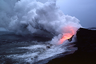 Glow of lava reflected in steam plume east of Kupapa'u Point, on the Big Island of Hawaii