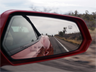 The side mirror view from an automobile