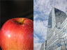 An apple and a skyscraper full of windows
