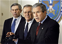 Deputy Secretary of Defense Wolfowitz, Defense Secretary Rumsfeld, and President Bush in a press conference on September 17, 2001