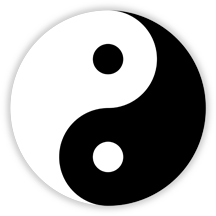 The Yin and Yang symbol with white representing Yang and black representing Yin